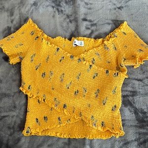 Cute gold cropped top in good condition.